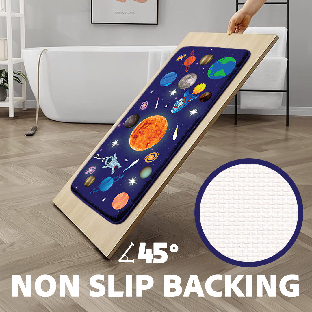 Khelo Space-Themed Kids Bath Mat with Non-Slip Backing – Designed for safety and comfort, this anti-slip bath rug features a vibrant outer space design with astronauts, planets, and rockets. The durable, non-slip backing ensures stability on wet bathroom floors, reducing the risk of slips and falls. Made from soft, absorbent material, this bath mat provides a cozy feel underfoot while keeping the bathroom dry. Perfect for kids' space-themed bathrooms, enhancing both decor and safety.