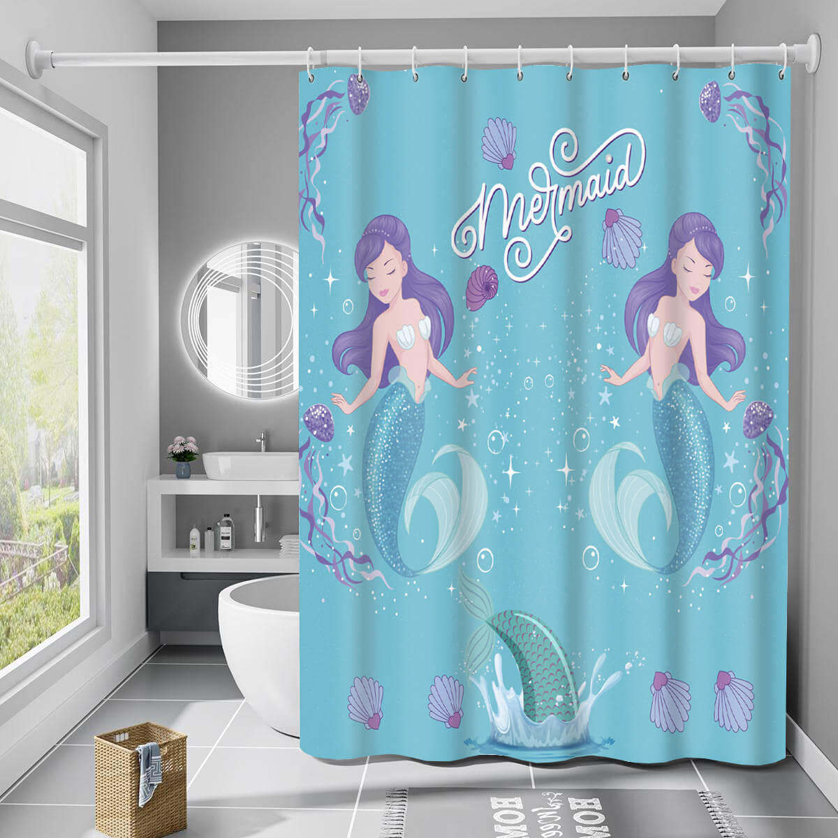 Lifestyle shot of the Magical Mermaids kids shower curtain in a bright, modern bathroom. Features whimsical mermaid illustrations, seashells, and an ocean theme, adding charm and functionality to kids' bathroom decor.