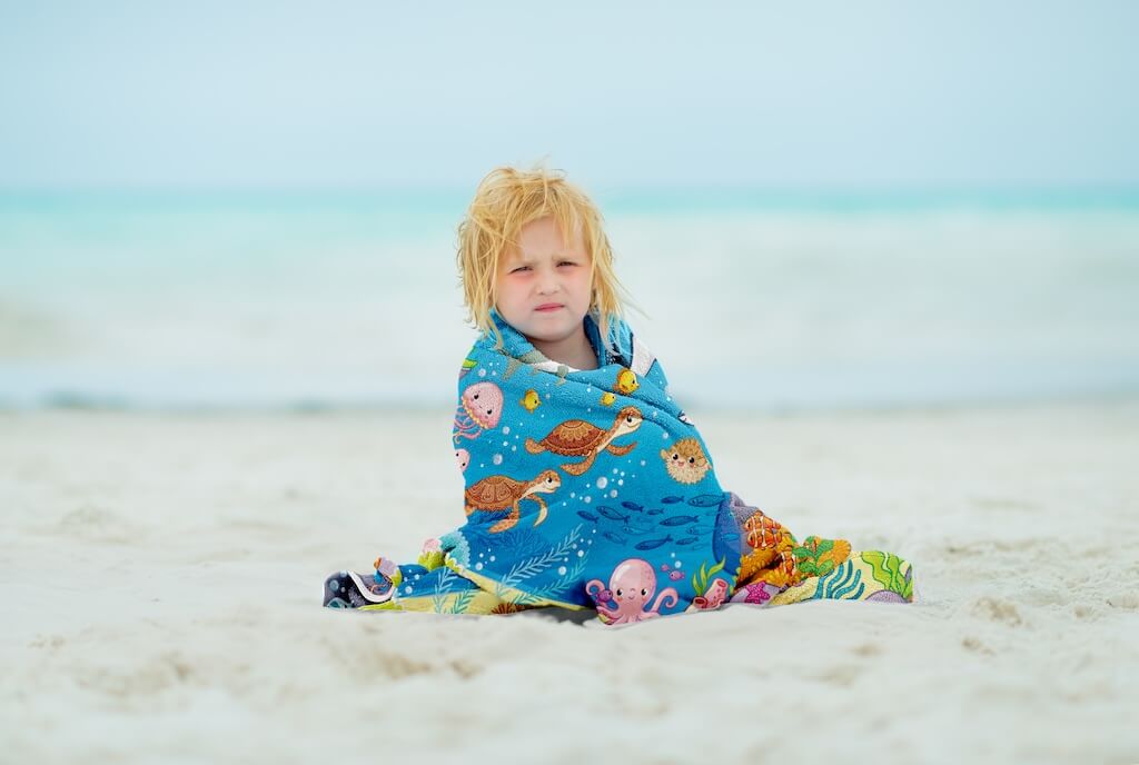 100% Organic Cotton Kids Bath Towel featuring a colorful Sea, Ocean, and Fish theme. Ultra-soft, highly absorbent, lightweight, and machine washable. Perfect for boys and girls who love marine life. Ideal for bath, beach, and pool use. Available at Khelo.co.