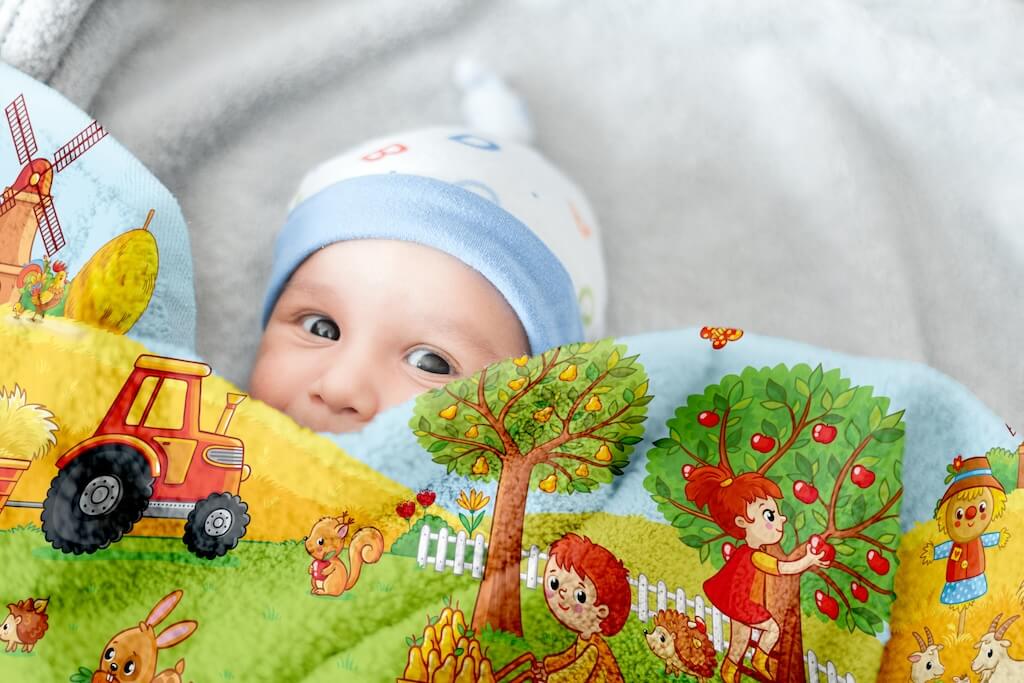 A delightful organic cotton towel featuring an adorable farm animals and countryside design, perfect for kids. This ultra-soft, highly absorbent towel is made from 100% organic cotton, ensuring comfort and gentle care for children's sensitive skin. The vibrant print showcases playful farm animals, trees, tractors, and countryside elements, making it an engaging and fun bath or beach towel. Lightweight, durable, and machine washable, this eco-friendly towel is an excellent choice for parents.